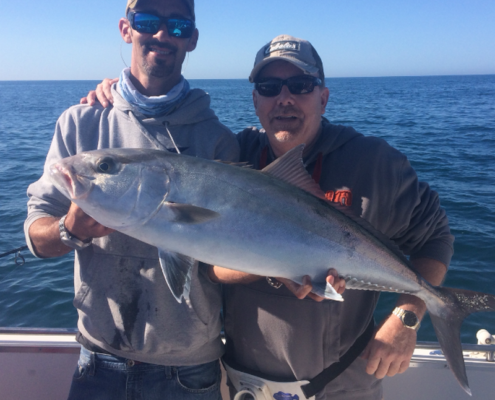 A happy client with a nice Amberjack.